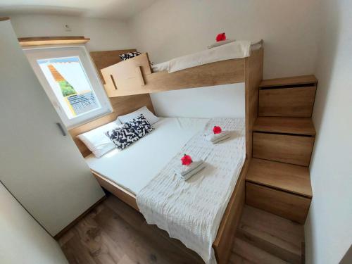 Katil atau katil-katil dalam bilik di Mobile homes Charly