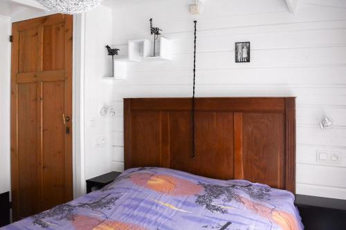 מיטה או מיטות בחדר ב-Chalet Den Keibilk