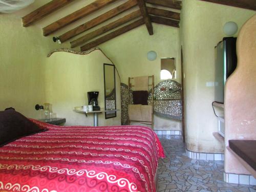 Lova arba lovos apgyvendinimo įstaigoje Eco Hotel La Jicarita