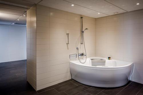 Koupelna v ubytování Holiday Inn Eindhoven Centre by IHG