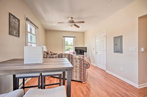 a living room with a couch and a ceiling fan at 3 Mi to Lake Michigan Pet-Friendly Apt in Sawyer in Sawyer
