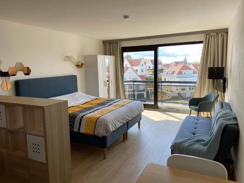 Postel nebo postele na pokoji v ubytování Apartment Bel-Air