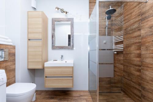 ห้องน้ำของ Jantar Apartamenty - Biały Dom