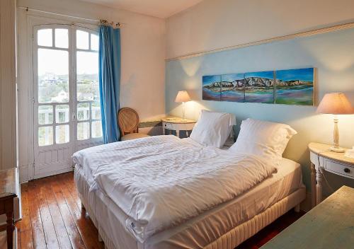 Postel nebo postele na pokoji v ubytování Villa Les Cormorans, Vue Mer, 10 personnes