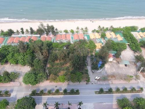 an aerial view of a resort with the beach at Khách sạn NHẬT MINH Cửa Lò in Cửa Lò