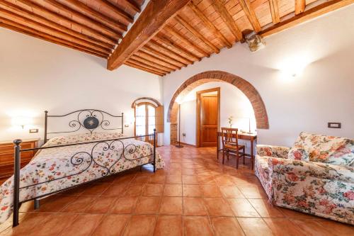 Voodi või voodid majutusasutuse Tenuta di Montecucco - ColleMassari Hospitality toas