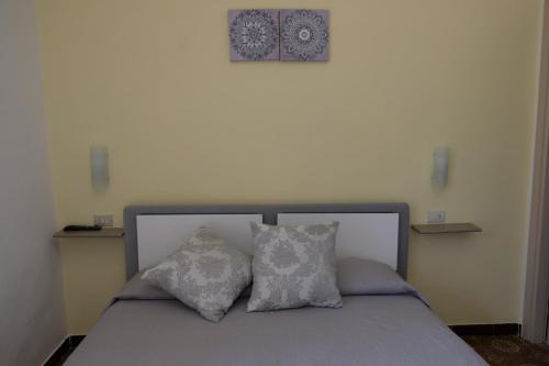 Postel nebo postele na pokoji v ubytování I Tredici Casali