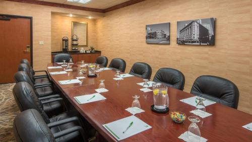 a conference room with a long table and chairs at Holiday Inn Denver Lakewood by IHG in Lakewood