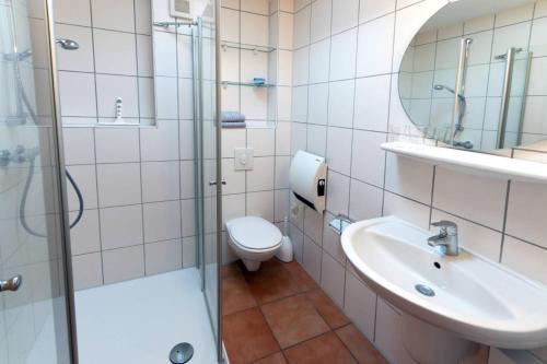Ванная комната в Ferienhaus Bettina