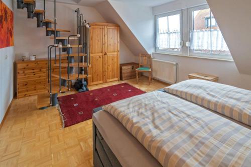 Postel nebo postele na pokoji v ubytování Ferienhaus Antje