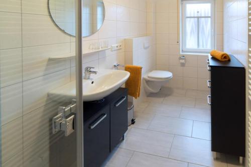 Ένα μπάνιο στο Ferienwohnung Endlich Urlaub