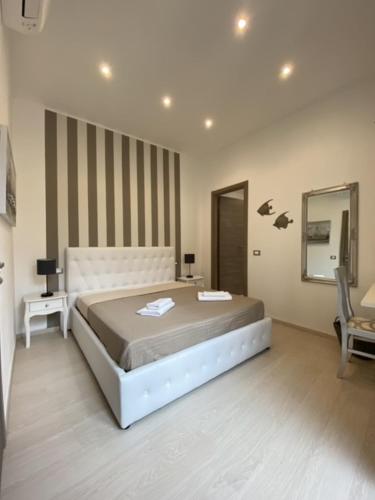 Postel nebo postele na pokoji v ubytování Maestrale Charme Rooms
