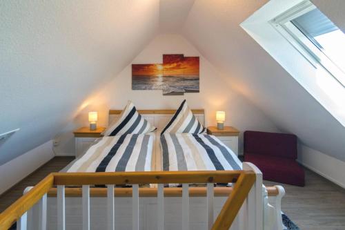 Postel nebo postele na pokoji v ubytování Ferienwohnung Noatun