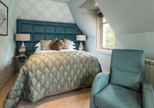 Ein Bett oder Betten in einem Zimmer der Unterkunft Cairn Lodge