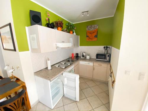 Η κουζίνα ή μικρή κουζίνα στο Appartmentanlage Zur Düne