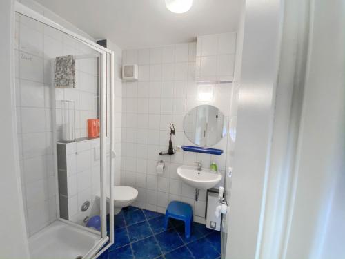 Ванна кімната в Appartmentanlage Zur Düne