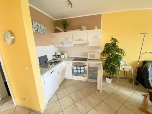 Η κουζίνα ή μικρή κουζίνα στο Appartmentanlage Zur Düne