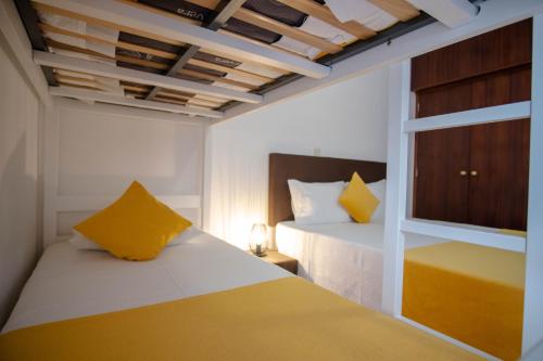 Postel nebo postele na pokoji v ubytování Gerês Guest House