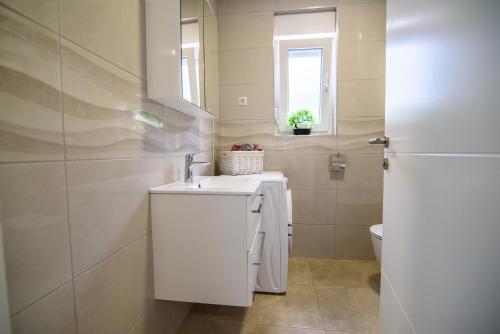 Koupelna v ubytování Lorena Luxury Apartment