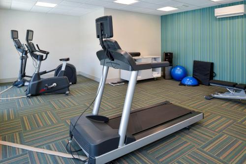 a gym with several exercise bikes and a treadmill at Holiday Inn Express & Suites - Elko by IHG in Elko