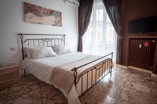 Giường trong phòng chung tại Civico 8 B&B - Appartamento