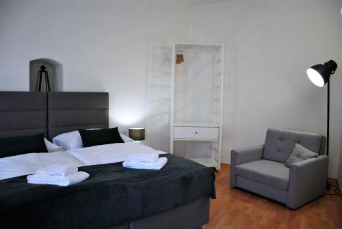 Lova arba lovos apgyvendinimo įstaigoje White Swan Boutique Apartments