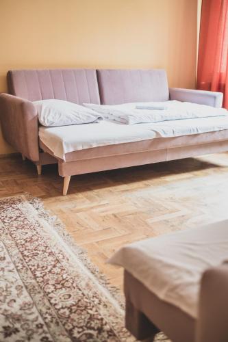 Cybulskiego Guest Roomsにあるベッド