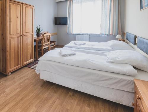 Cybulskiego Guest Roomsにあるベッド