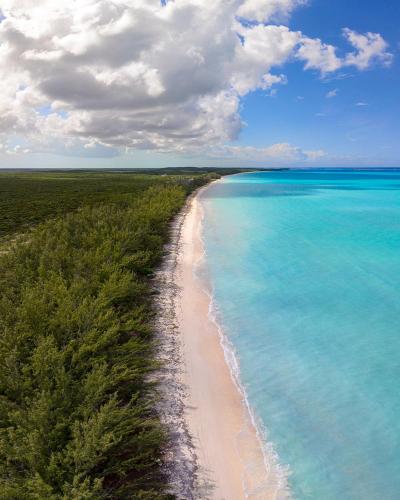 an aerial view of a beach in the ocean at Northwest Point Resort in Wheeland Settlement