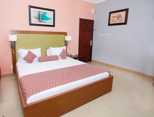 Ένα ή περισσότερα κρεβάτια σε δωμάτιο στο Prestige Suites