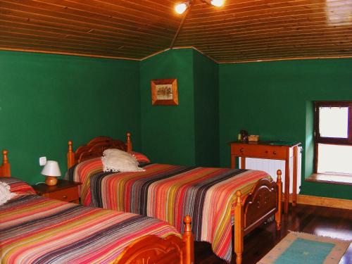 Ένα ή περισσότερα κρεβάτια σε δωμάτιο στο Casa Rural Altzuste Landetxea