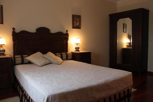 Giường trong phòng chung tại Casa das Leiras