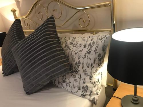 Katil atau katil-katil dalam bilik di Princetown Guesthouse