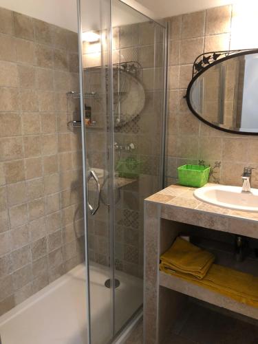 a bathroom with a shower and a sink at Villa Capraghjese in Galeria