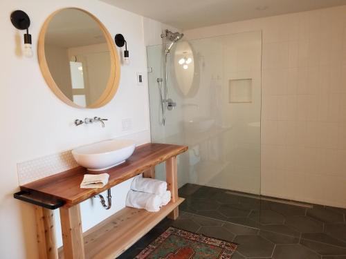 a bathroom with a sink and a shower at 378 Marine Drive in Ucluelet