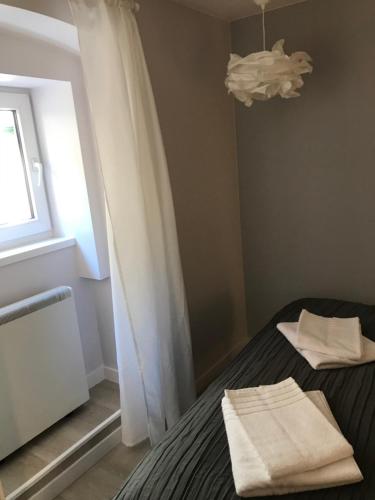 Posteľ alebo postele v izbe v ubytovaní Apartamenty Stary Rynek 25 Oficyna Toruń