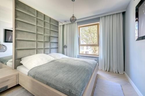 Posteľ alebo postele v izbe v ubytovaní 3 City apartments - Syma