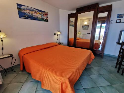 Ένα ή περισσότερα κρεβάτια σε δωμάτιο στο Residence Eden