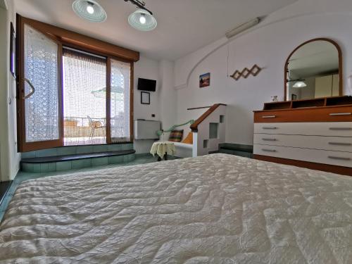 Ένα ή περισσότερα κρεβάτια σε δωμάτιο στο Residence Eden