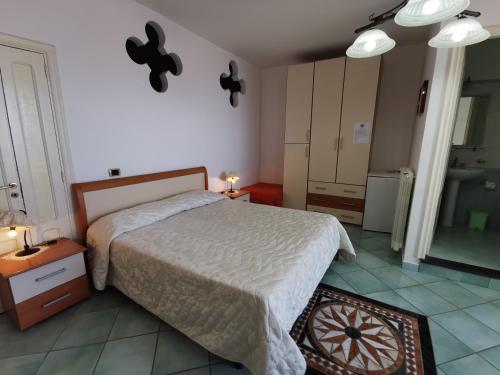 Ένα ή περισσότερα κρεβάτια σε δωμάτιο στο Residence Eden