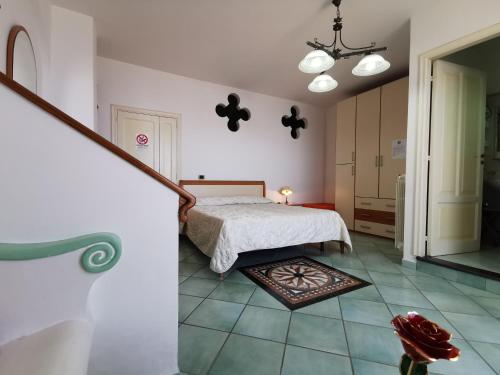 Ένα ή περισσότερα κρεβάτια σε δωμάτιο στο Residence Eden