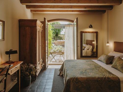 Postel nebo postele na pokoji v ubytování Mas Generós - Adults-Only Eco Hotel
