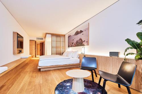 ART HOUSE Basel - Member of Design Hotelsにあるベッド