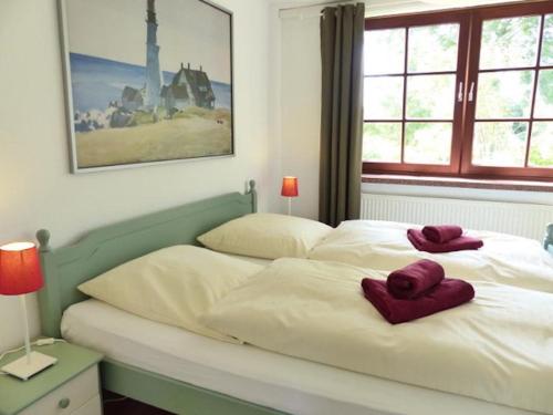 Postel nebo postele na pokoji v ubytování Schwanenhof (EG)