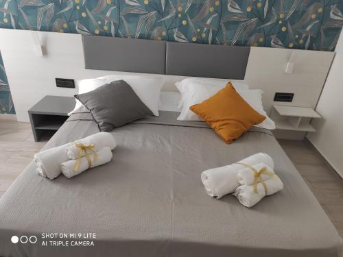 Ένα ή περισσότερα κρεβάτια σε δωμάτιο στο Thalya Luxury Rooms