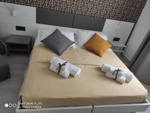 Ένα ή περισσότερα κρεβάτια σε δωμάτιο στο Thalya Luxury Rooms