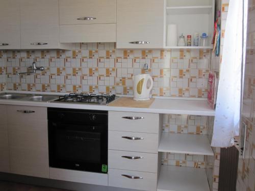 Küche/Küchenzeile in der Unterkunft Casa Vacanza Isola Rossa