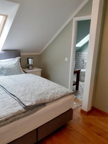 Postel nebo postele na pokoji v ubytování A Zoldbiciklis Haz