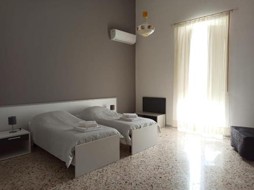 Ein Bett oder Betten in einem Zimmer der Unterkunft Calle dei Saraceni