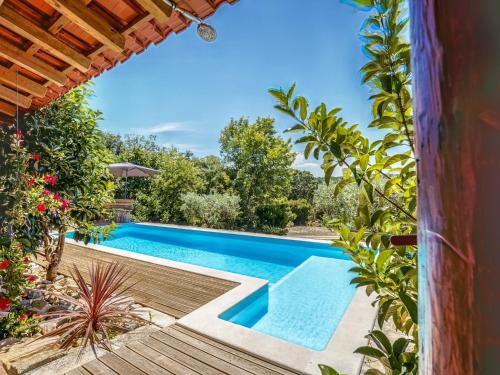 a pool in the backyard of a house at Striking Holiday Home in Carcavelos with Swimming Pool in Carcavelos